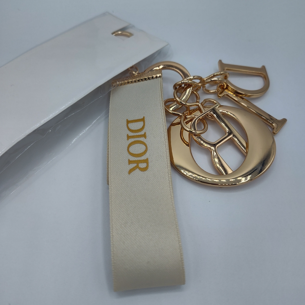 NWT Dior Gold Charm Keychain w/ Logo Ribbon – Lux Collectible Must-Have! - Picture 2 of 2